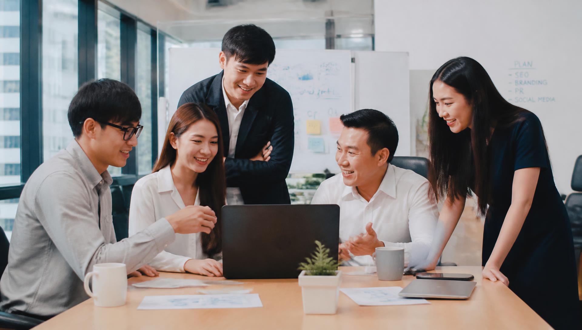 Wonder partners collaborating in a modern office